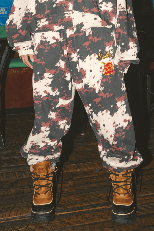 Sabbi - The Cow Print Cuffed Sweat Pants